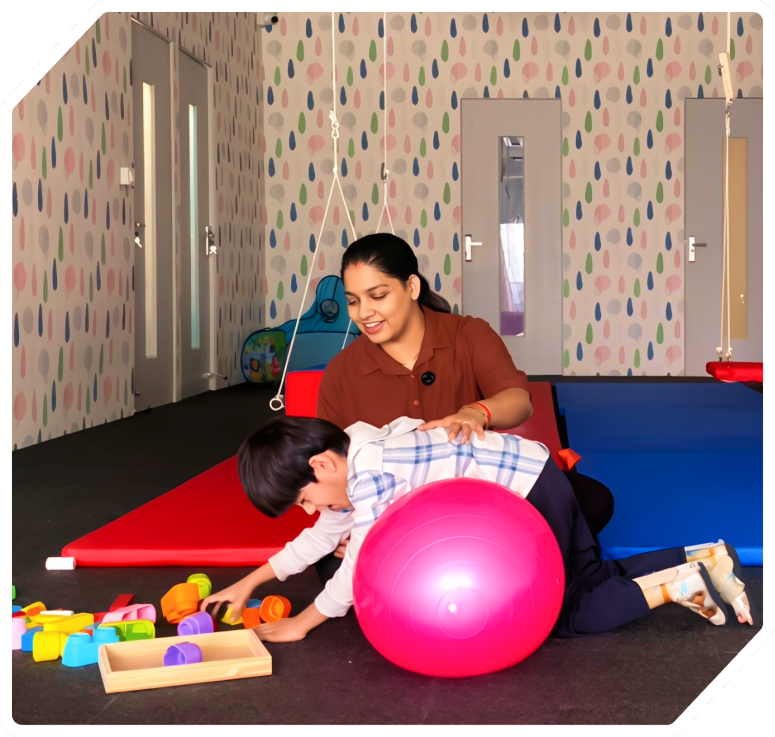 Occupational therapist working with child in Noida clinic