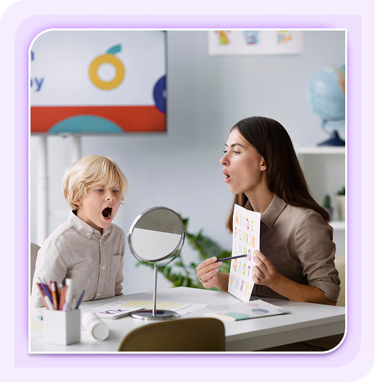 Happy child with speech therapist in Noida - Speech therapy session